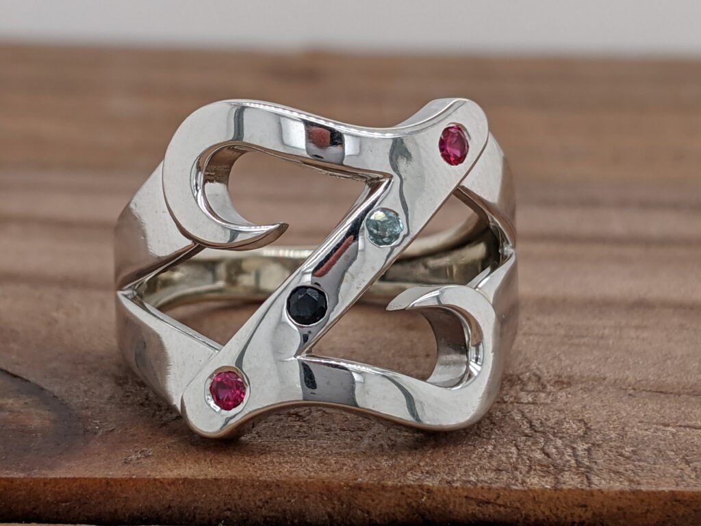 A Ring with the letter "Z" with birthstones