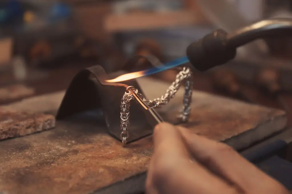 A Jeweler fixing a bracelet